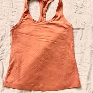 Peach colored lululemon short tank